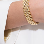 model wearing gala bracelet in gold