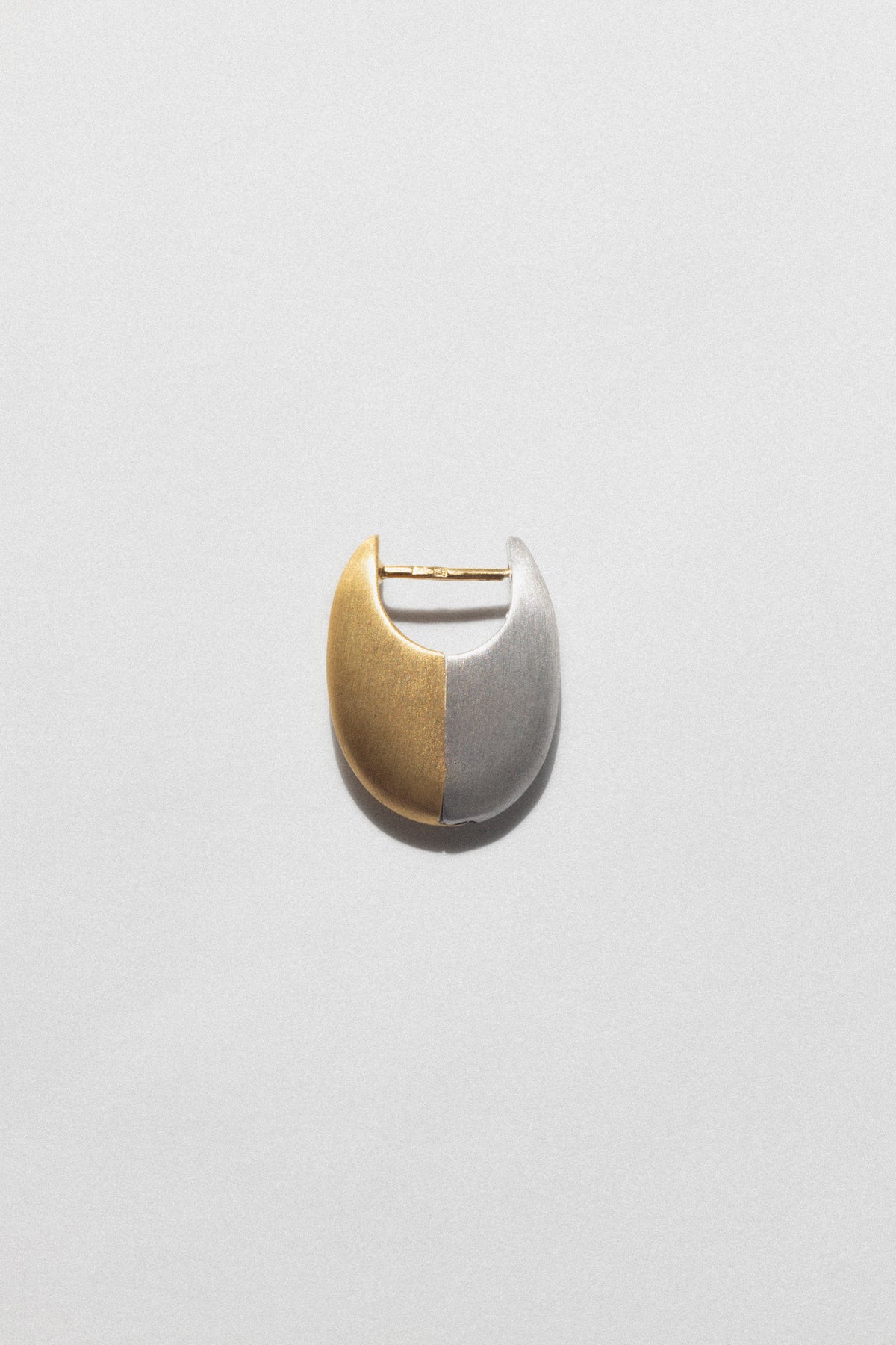 CINCO Two Tone Earrings featuring a combination of polished gold and silver finishes, highlighting the two tone silver gold jewelry design.