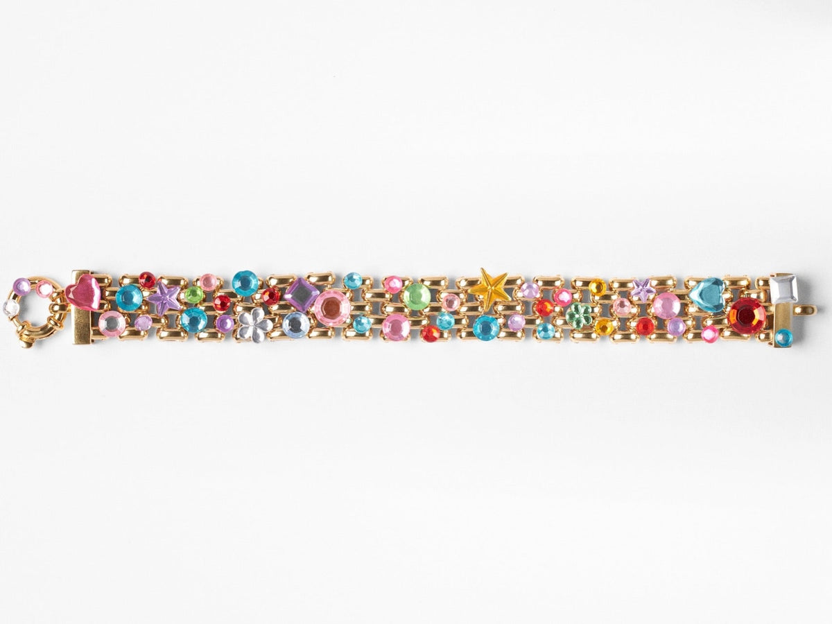 contemporary gemstone jewelry bracelet featuring colorful gemstones and a gold setting