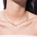 model wearing alphabet necklace with pendant B in gold