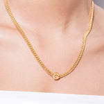 model wearing alphabet necklace with pendant G in gold