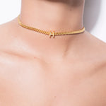 model wearing alphabet necklace with pendant H in gold