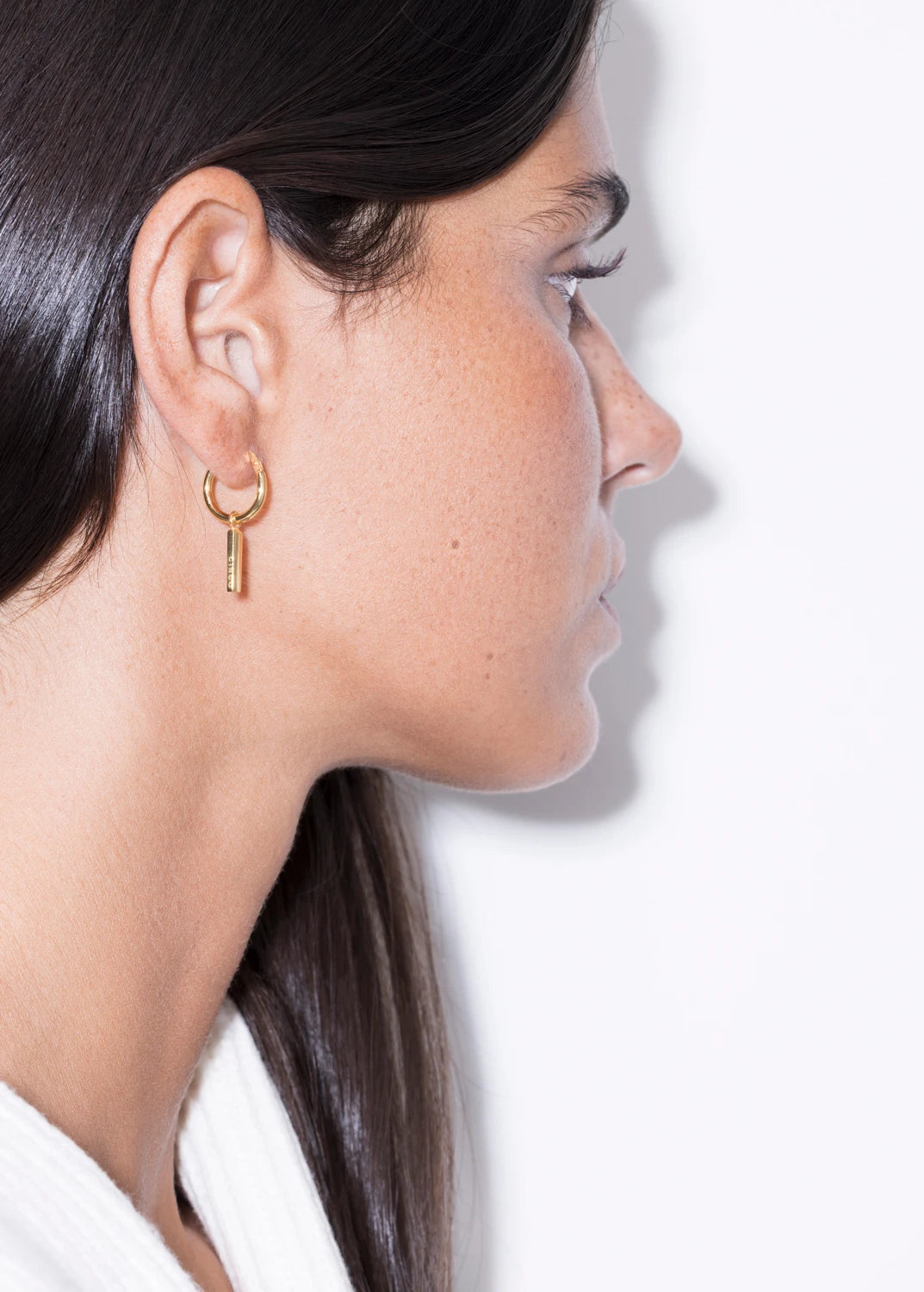 bela huggies earrings