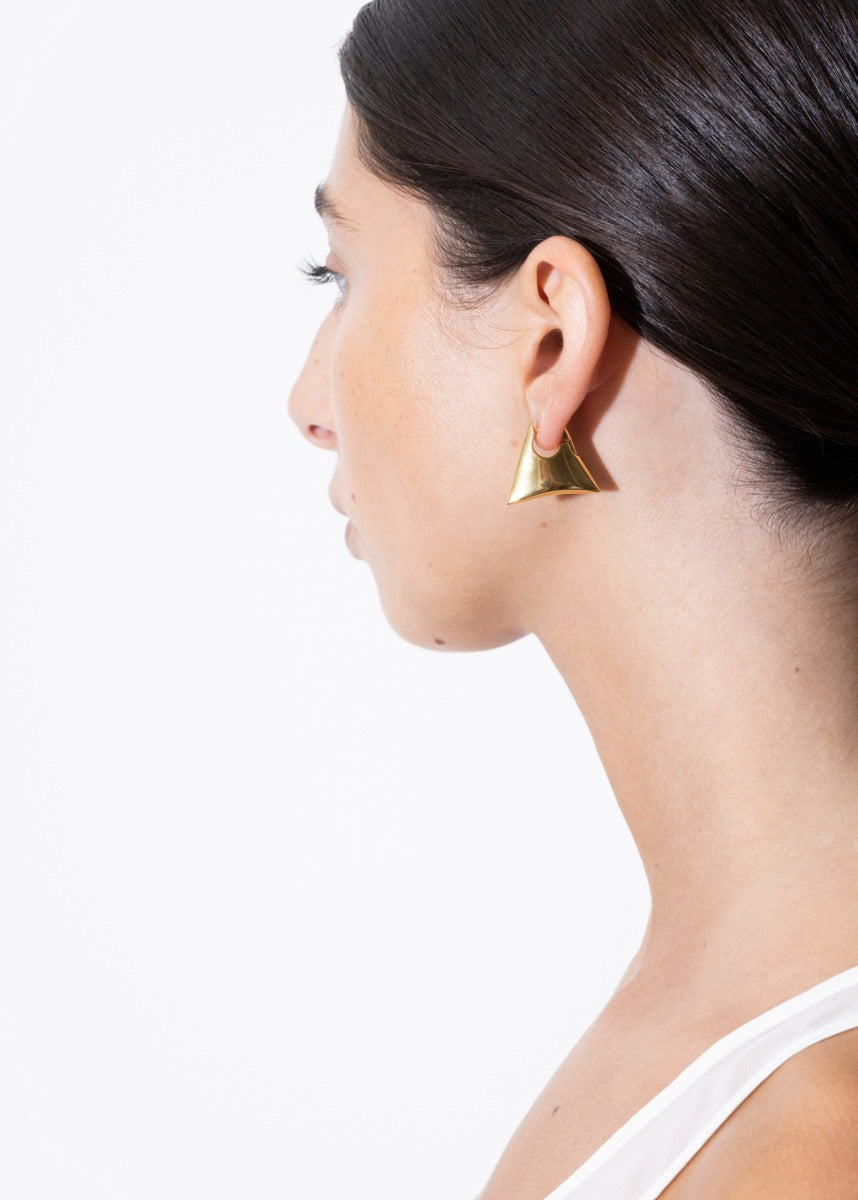 model wearing blake earrings in gold