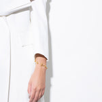 model wearing elin bracelet in gold