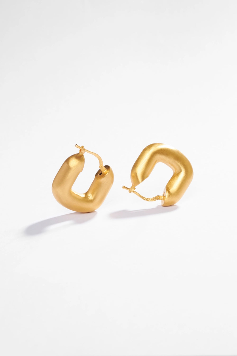 magda huggies earrings
